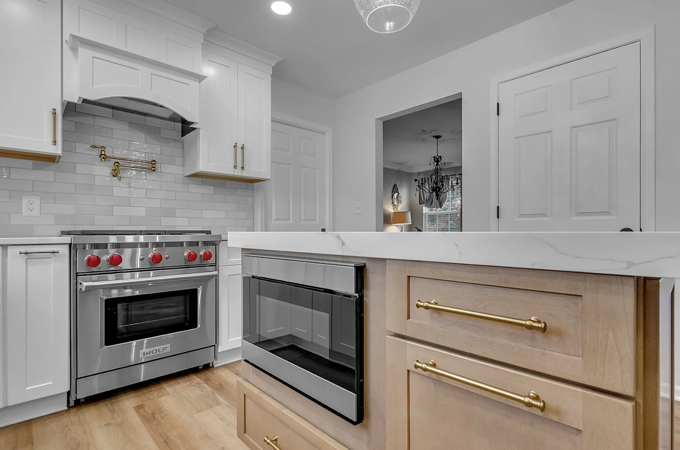 Kitchen with Wolf Range and Natural Wood Island - Sireika Renovations