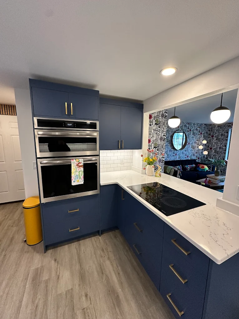 Bold Navy Blue Cabinet Kitchen with Gold Hardware - Sireika Renovations